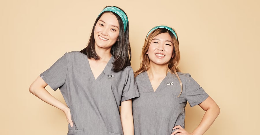 Two of the team members at Tend Dentall. Standing, smiling for the camera.