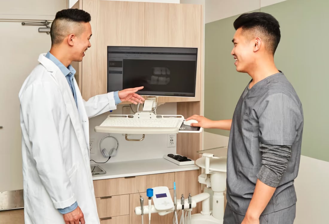 Dental Team Members Working Together at Tend Dental