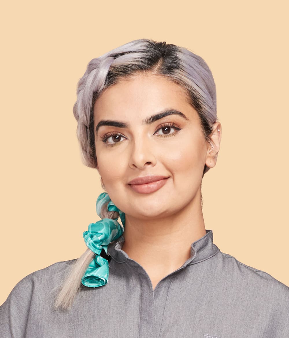 Picture of Our Clinical Director of Hygiene & Assisting Aska Zafar